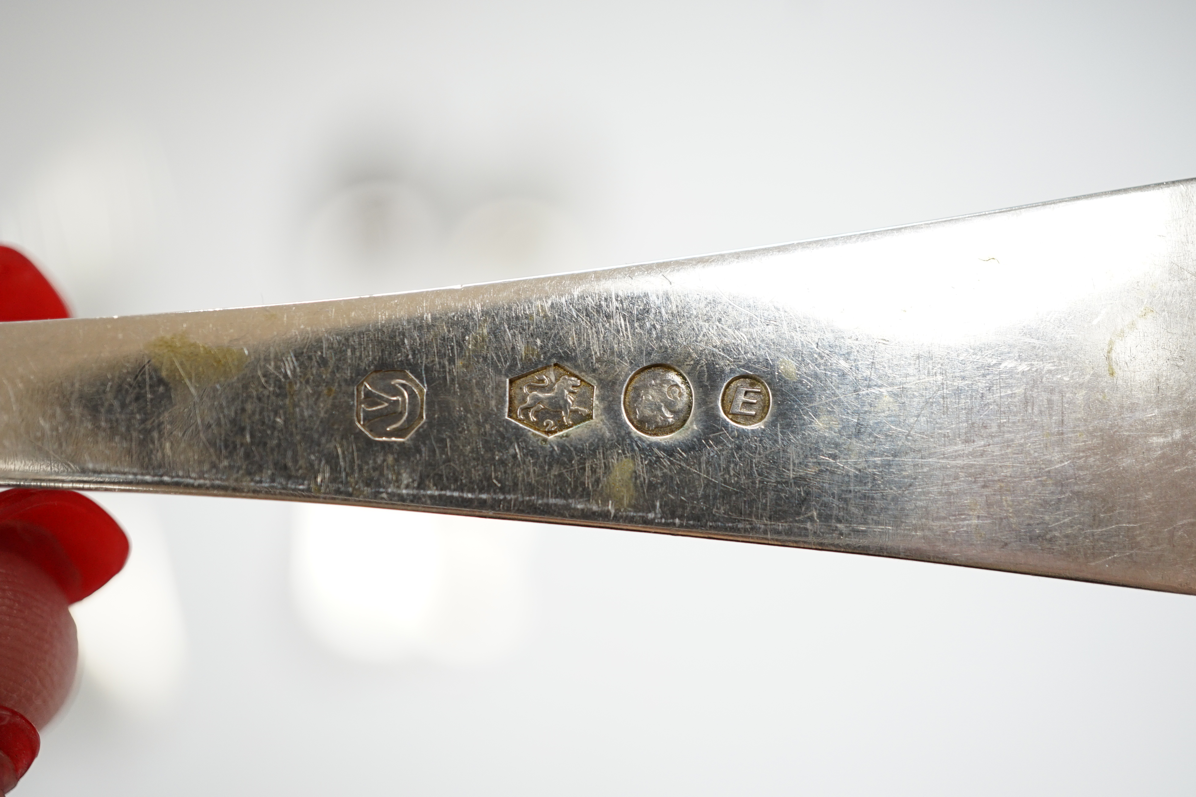 A large quantity of assorted Dutch 833 standard white metal flatware, comprising sixty eight items, 115.4oz, together with seven items of silver plated flatware.